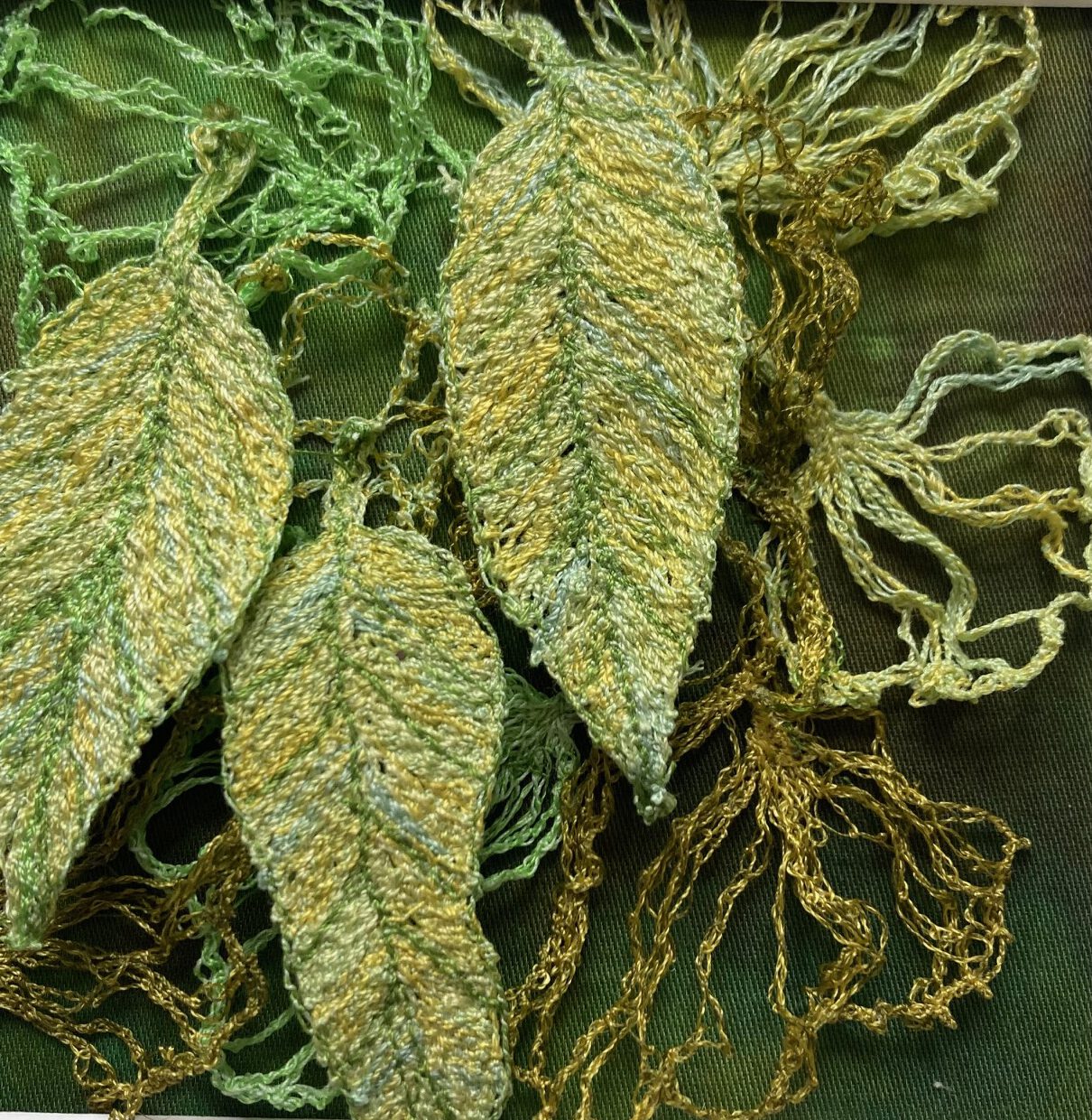 Detailaufnahme von Blättern mit feiner Aderstruktur in Grün.